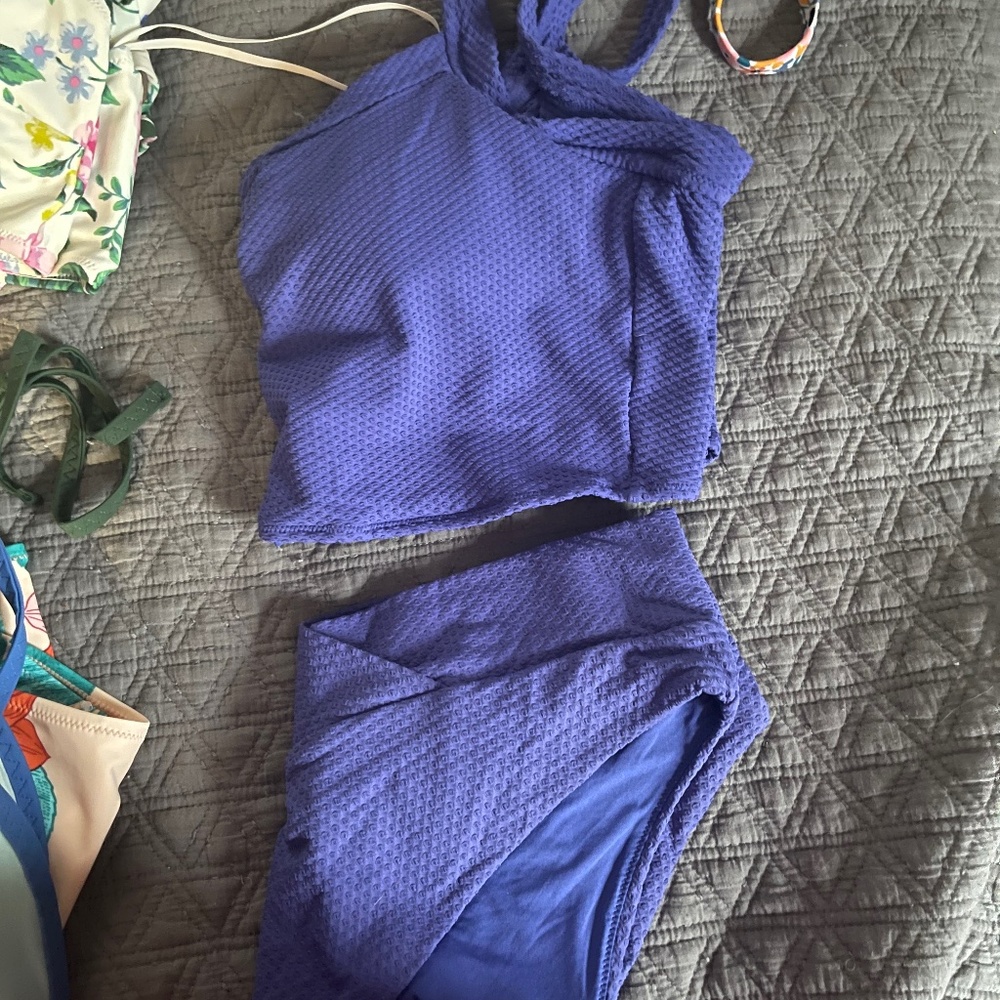 Bill lot of used once or new bathing suits